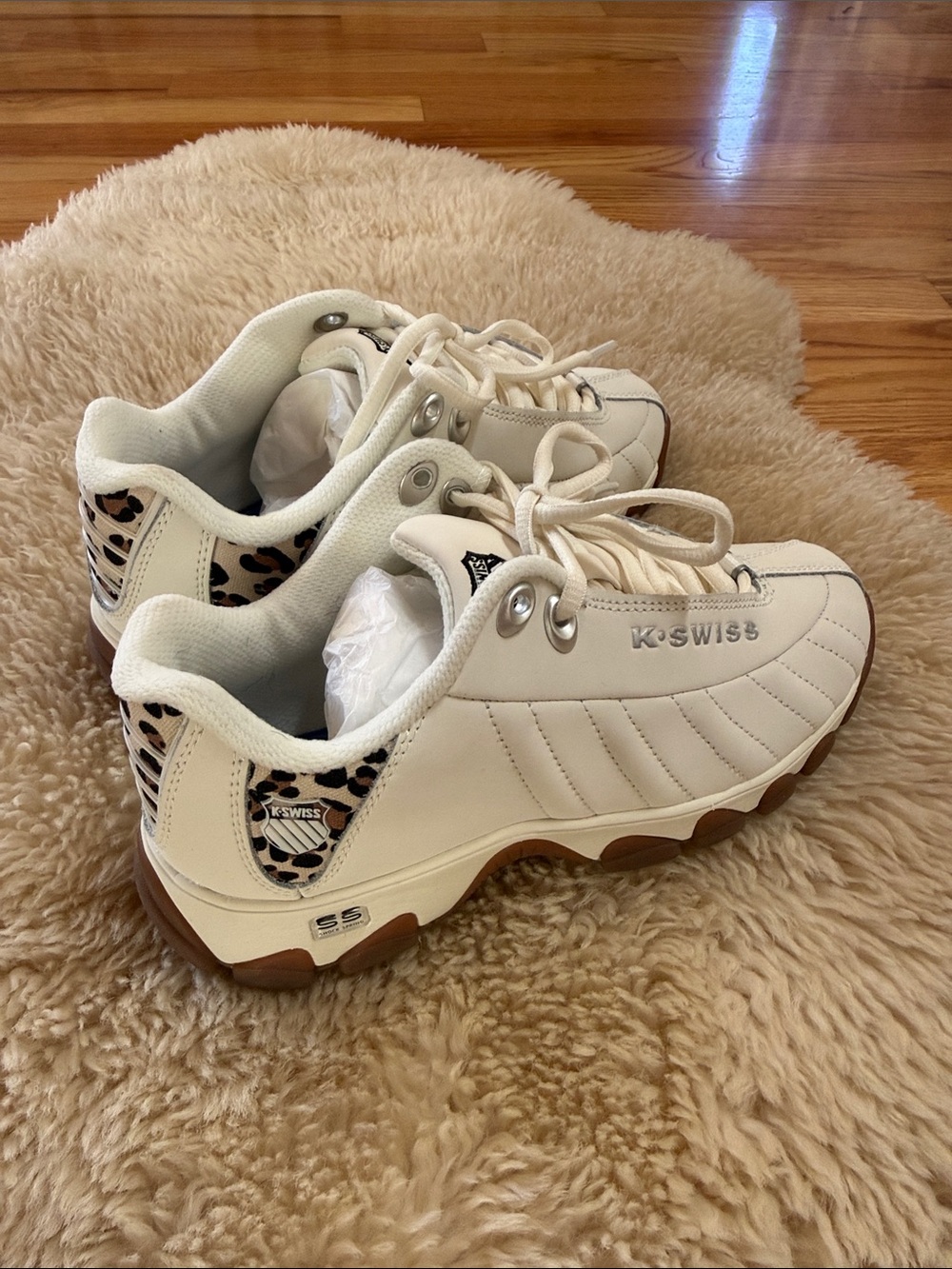K-Swiss Women's White Leather Sneakers with Leopard Accent and Gum Sole